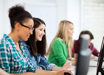 Image showing students with computers studying at school