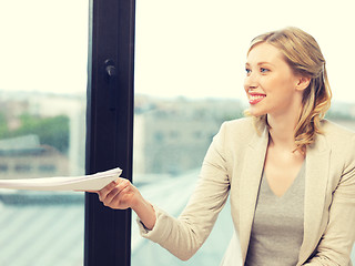 Image showing happy woman with documents