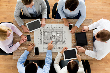 Image showing business team or architects with blueprint