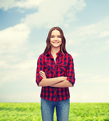 Image showing smiling young woman in casual clothes