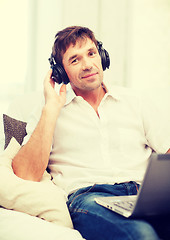 Image showing man with headphones listening to music