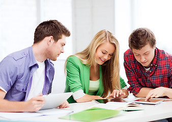 Image showing students browsing in tablet pc at school