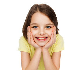 Image showing smiling little girl over white background