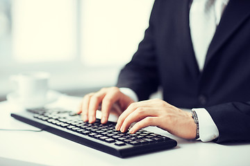 Image showing man hands typing on keyboard