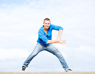 Image showing handsome boy making dance move