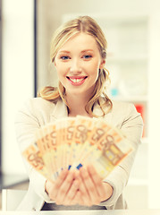 Image showing lovely woman with euro cash money