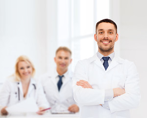 Image showing smiling male doctor in white coat