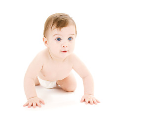 Image showing crawling curious baby