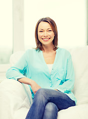 Image showing smiling woman at home