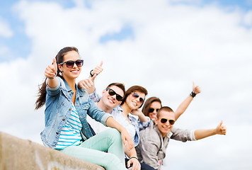 Image showing teenagers showing thumbs up