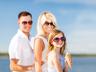 Image showing happy family eating ice cream