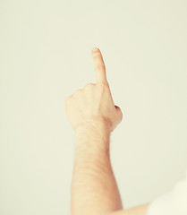 Image showing man hand pointing at something