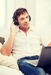 Image showing man with headphones listening to music