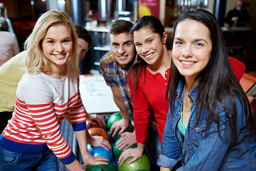 Image showing happy friends in bowling club