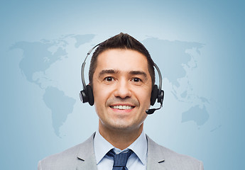 Image showing smiling businessman in headset