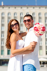 Image showing smiling couple in city