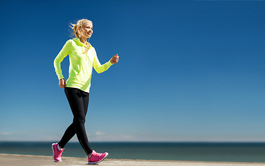 Image showing woman doing sports outdoors