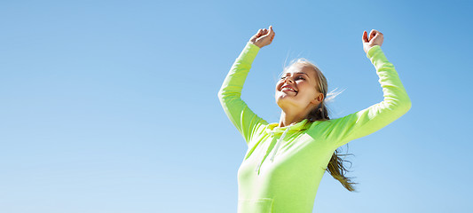 Image showing woman runner celebrating victory