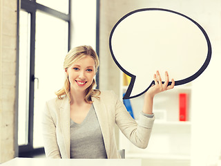 Image showing smiling businesswoman with blank text bubble