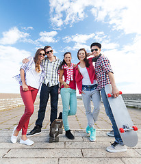 Image showing teenagers with skates outside