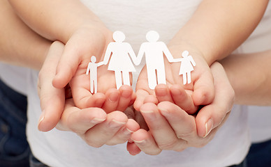 Image showing close up of woman and girl hands with paper family