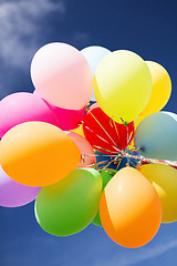 Image showing lots of colorful balloons in the sky