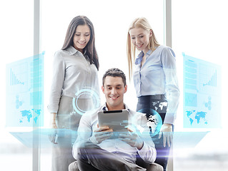 Image showing business team working with tablet pc in office