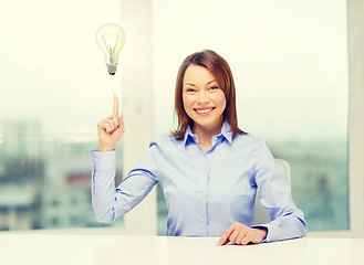 Image showing attractive businesswoman at office