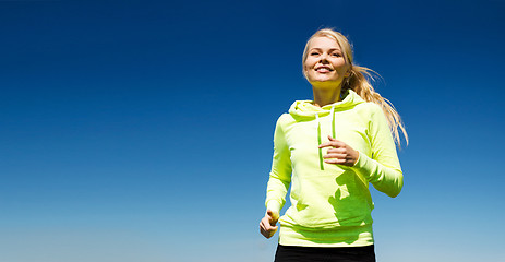 Image showing woman jogging outdoors