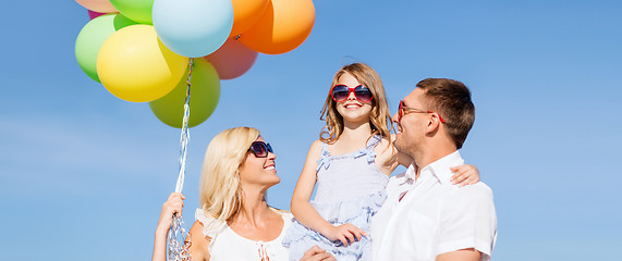 Image showing family with colorful balloons