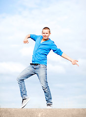 Image showing handsome boy making dance move