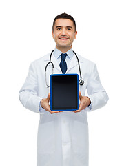 Image showing smiling male doctor with tablet pc