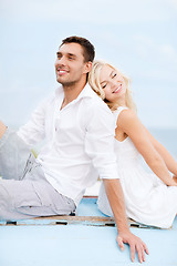 Image showing couple in shades at sea side