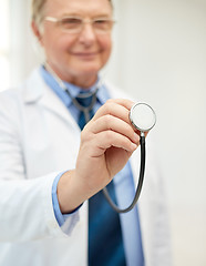 Image showing close up of doctor in white coat with stethoscope