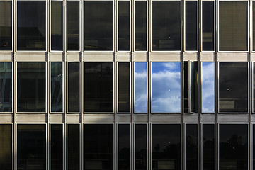 Image showing Clouds reflected on windows