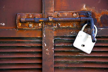 Image showing   closed rusty door   varese italy mornago
