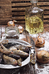 Image showing raw fish on the table cooks