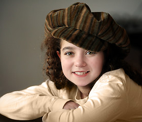 Image showing Smiling girl in a hat