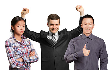 Image showing Asian team and businessman with hands up