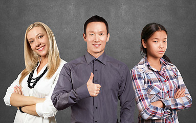 Image showing Asian team and businesswoman with crossed hands