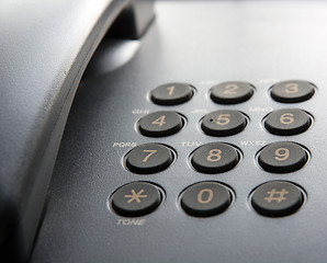 Image showing Black landline phone.