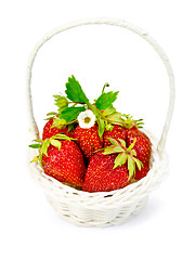 Image showing Strawberry in wicker basket with leaves