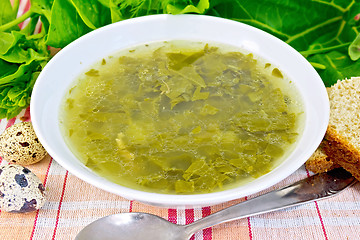 Image showing Soup of greenery on linen fabric