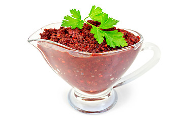 Image showing Adjika in glass gravy boat with parsley