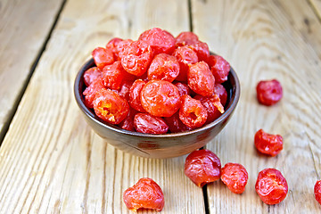 Image showing Candied cherries in bowl on board