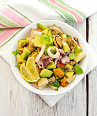 Image showing Salad seafood and avocado on white board