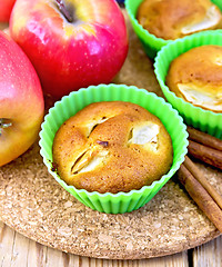 Image showing Cupcake with apples on wooden board