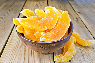 Image showing Candied melon in bowl on board