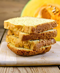 Image showing Bread pumpkin homemade slices on board