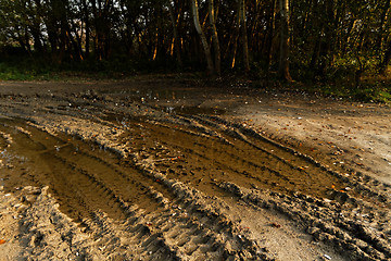 Image showing Dirty broken rural road 